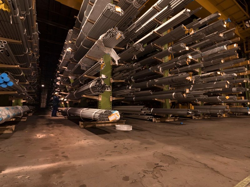 Cantilever warehouse rack storing pipes and long materials