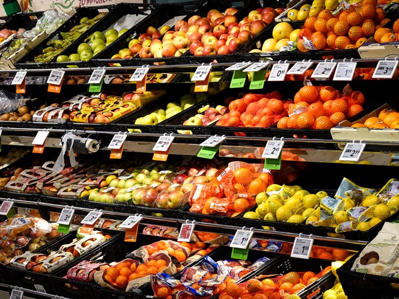 Fruit and vegetable display rack in a supermarket produce section