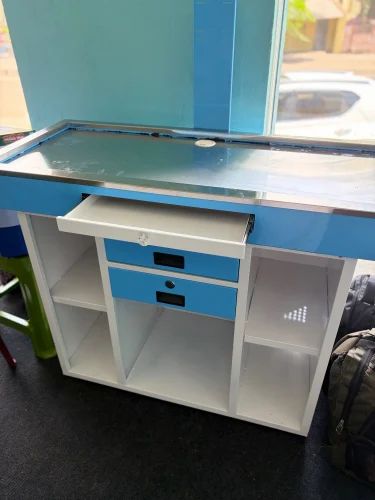 Blue and white supermarket checkout billing counter