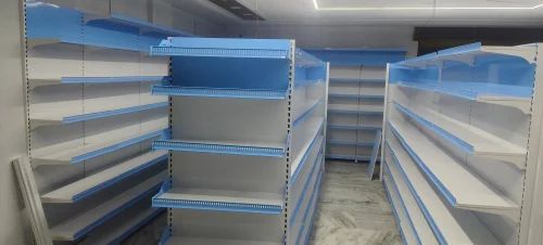 Blue and white gondola rack aisle installed in a supermarket