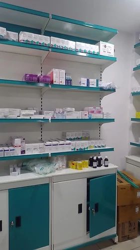 Pharmacy wall racks stocked with medicines in a medical shop